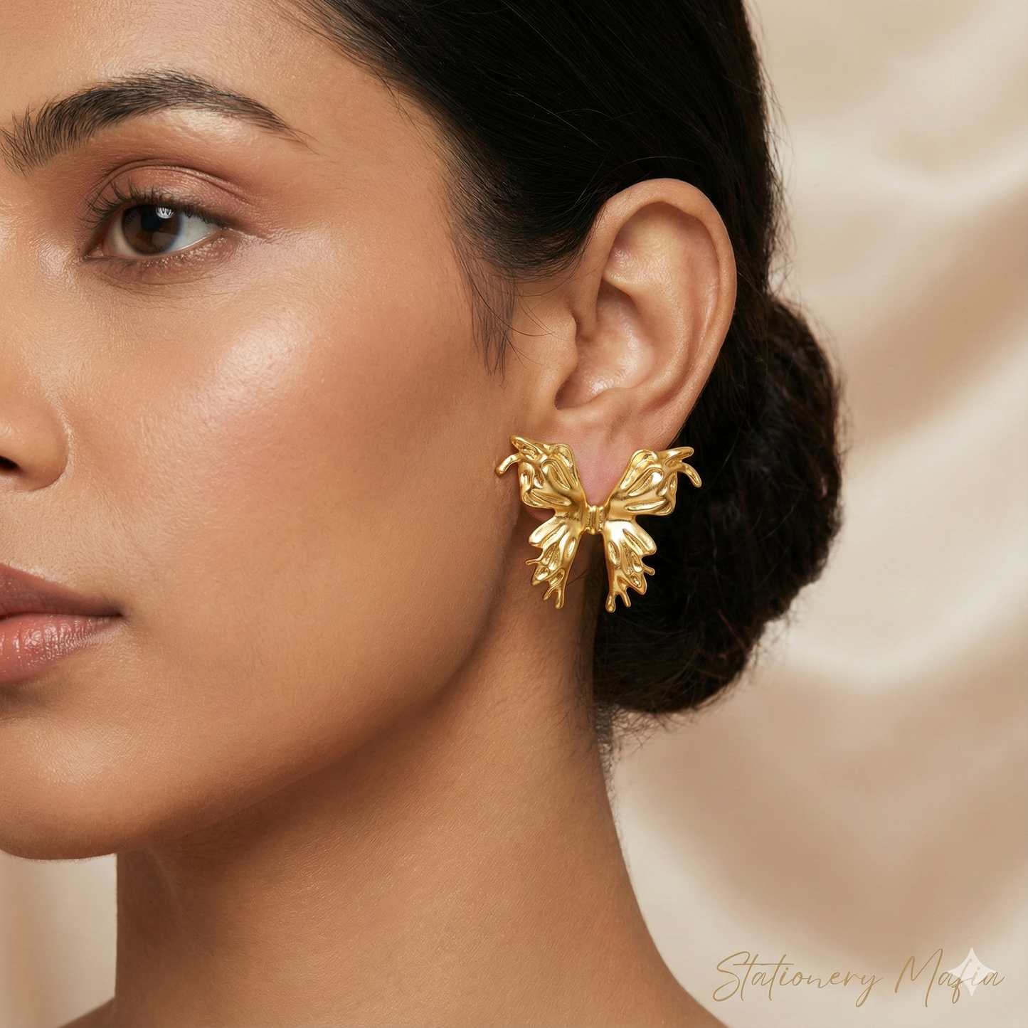 Golden Flutter Bow Studs